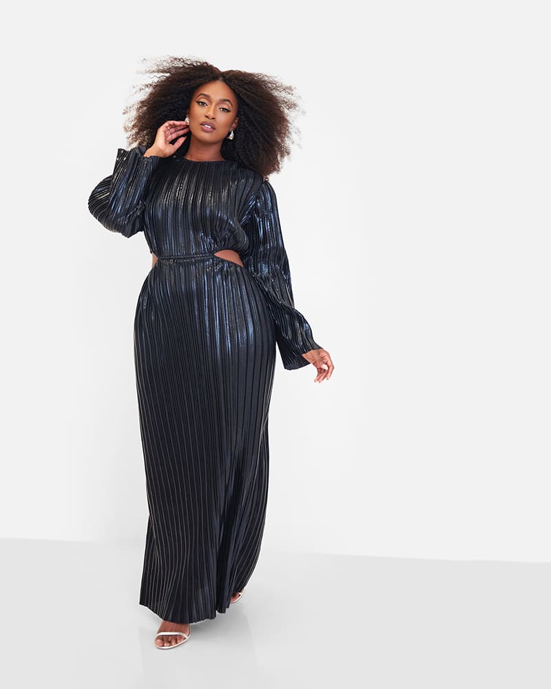 Front of a model wearing a size 2X Octavia Metallic Plisse Open Back Maxi Shift Dress - Black in black by Rebdolls. | dia_product_style_image_id:324917